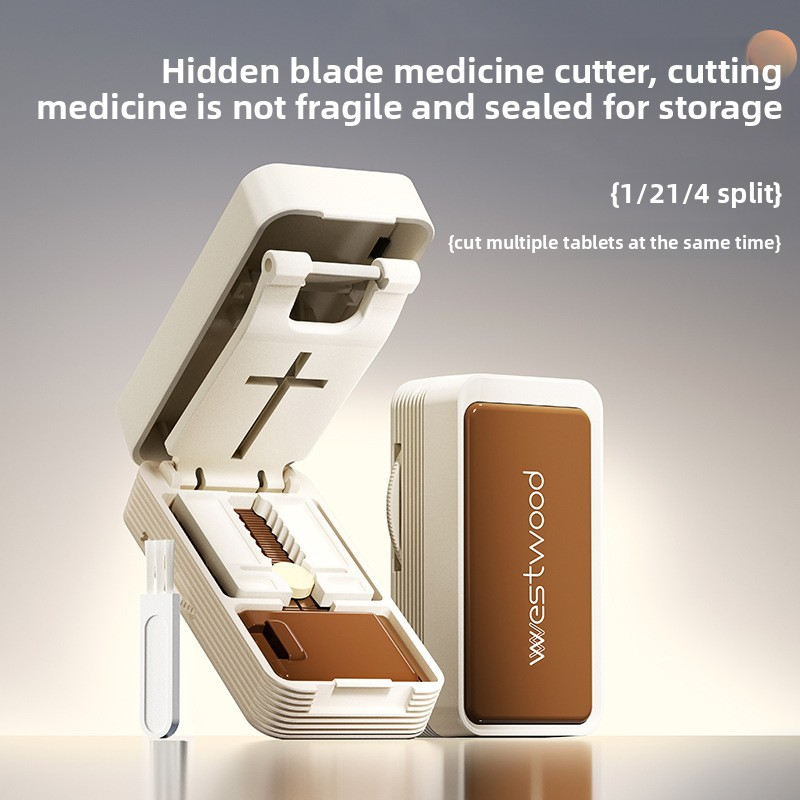 Quarter cut medicine dispenser accurately divides everything into two pills and a portable storage box