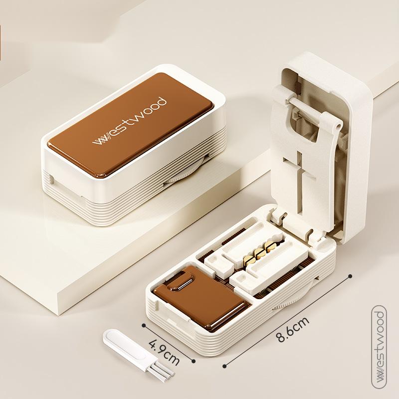 Quarter cut medicine dispenser accurately divides everything into two pills and a portable storage box